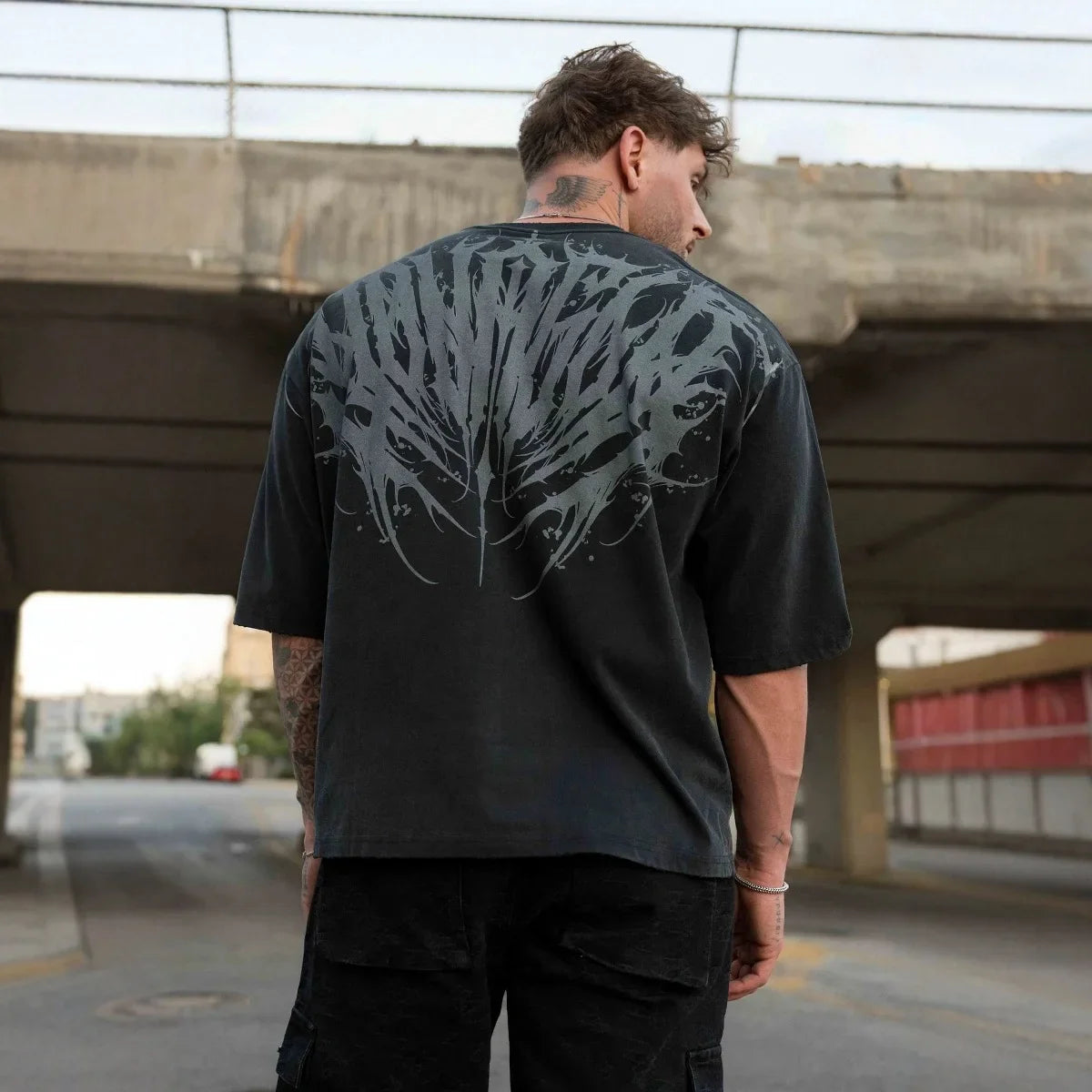 🪽 Fallen Wings – Oversized Faded Tee