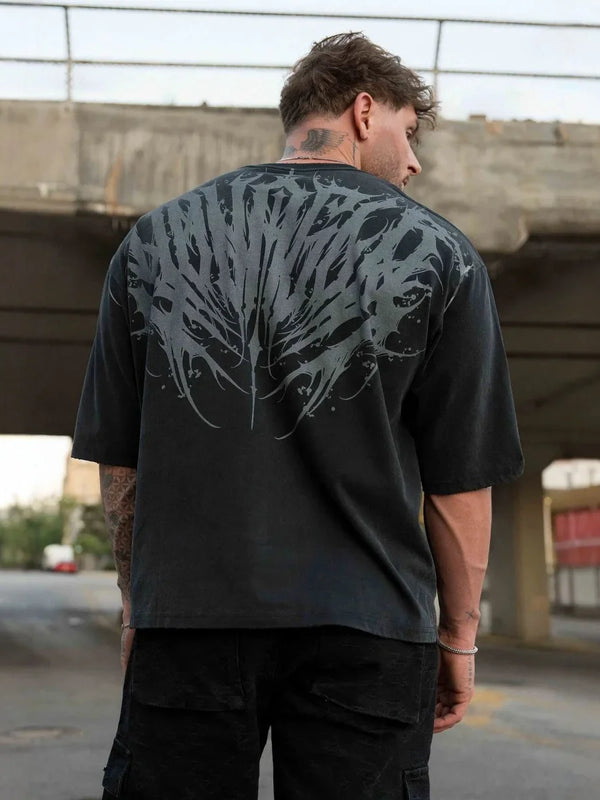 🪽 Fallen Wings – Oversized Faded Tee