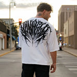 🪽 Fallen Wings – Oversized Faded Tee